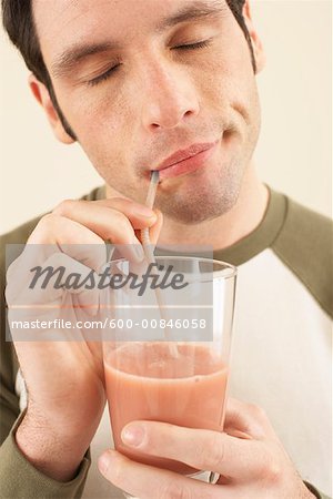 Man Drinking Chocolate Milk