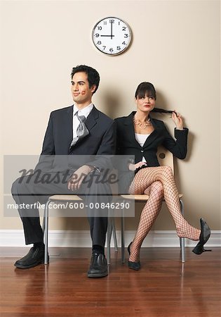 Woman and Man Flirting in Waiting Area