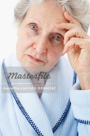 Portrait of Elderly Woman with Headache