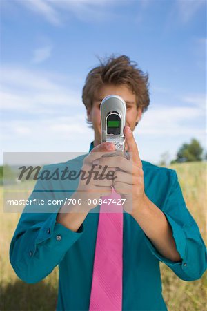 Man Taking Picture With Cell Phone