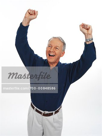 Man Cheering with Arms Raised