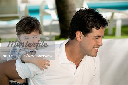 Close-up of a father with his son smiling