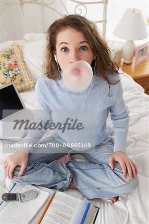Girl Listening to Music in Bedroom