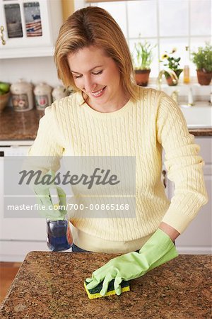 Woman Cleaning Kitchen