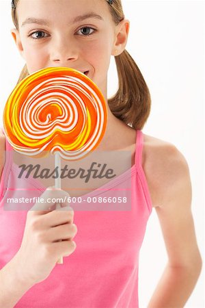 Girl Holding large Lollipop