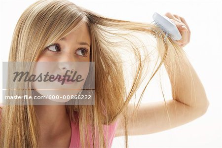 Girl Brushing Hair