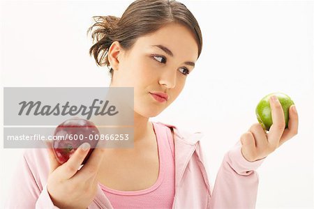 Girl Holding Apples