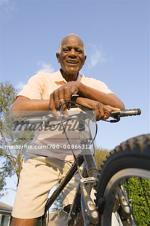 Portrait of Man Sitting on Bicycle