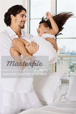 Father playing with his daughter