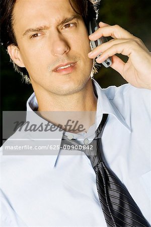 Close-up of a businessman talking on a mobile phone