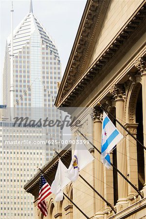 Low angle view of flags on a building, Chicago, Illinois, USA