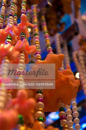 Low angle view of necklaces, New Orleans, Louisiana, USA