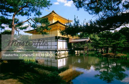 Reflection of a temple in water, Golden Pavilion, Kyoto, Japan