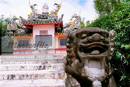 Close-up of a statue in front of a tomb, Ishigaki, Okinawa, Japan