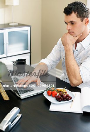 Man Using Laptop Computer
