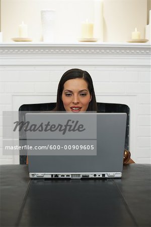 Woman Using Laptop Computer