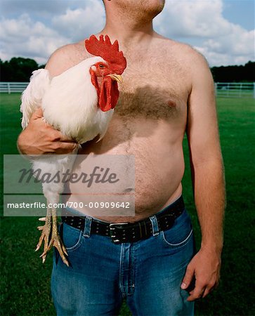 Man Holding Rooster