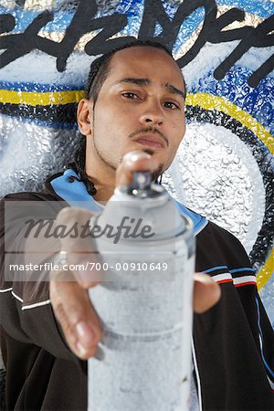 Man Holding Can of Spray Paint