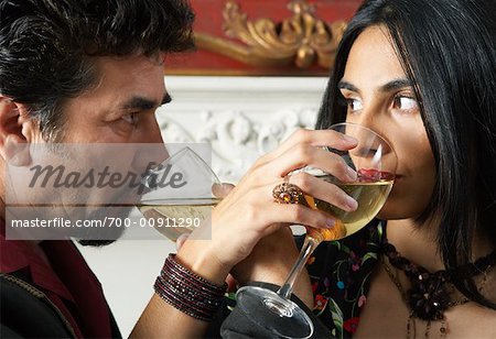 Close-up of Couple Drinking Wine