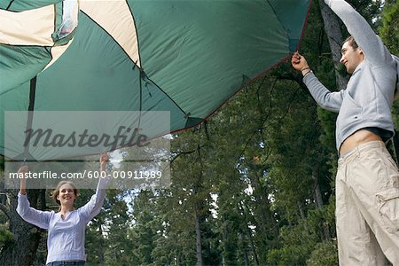 Couple Putting up Tent