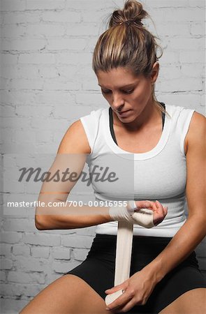 Woman Taping Hands