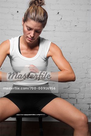 Woman Taping Hands