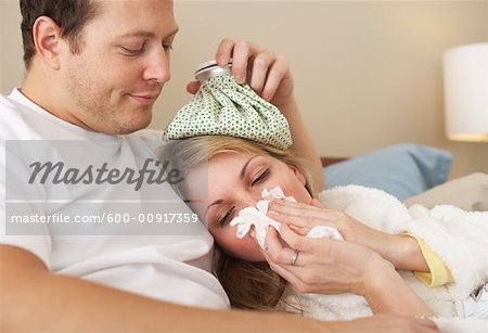 Sick Woman Being Comforted
