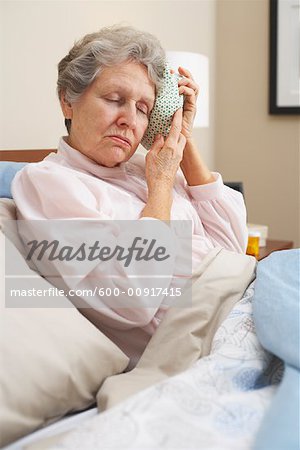 Portrait of Woman Using Ice Pack