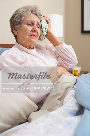 Portrait of Woman Using Ice Pack