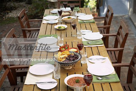 Table On Patio Set For Dinner