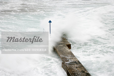 Waves Crashing on Pier, Canyamel, Majorca, Spain