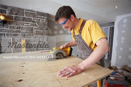 Man Using Saw