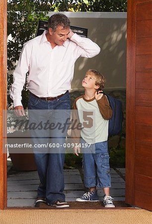 Father and Son Arriving Home Together