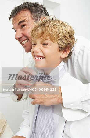 Father Helping Son Tie Necktie