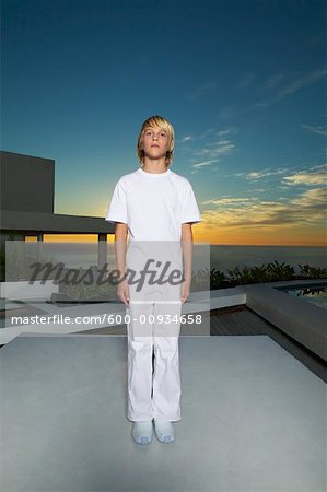 Portrait of Boy Standing on Patio