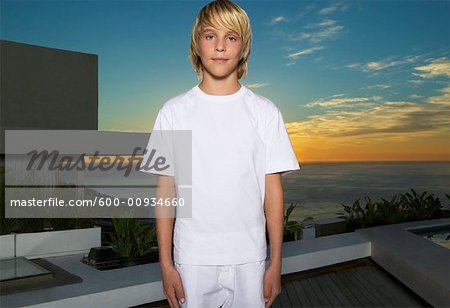 Portrait of Boy Standing on Patio