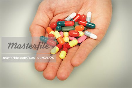 Hands Holding Pills