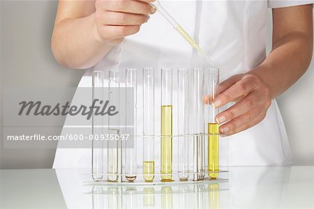 Doctor Using Test Tubes