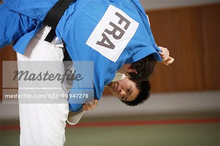 Two Men Competing in a Judo Match