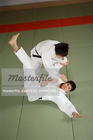 Two Men Competing in a Judo Match