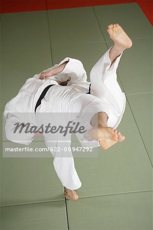 Two Men Competing in a Judo Match