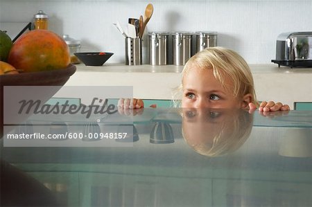 Girl Staring at Fruit Bowl