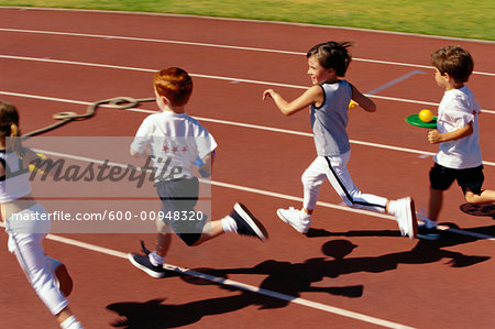 Kids Running Egg and Spoon Race