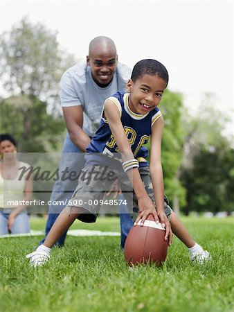 Family Playing in Park