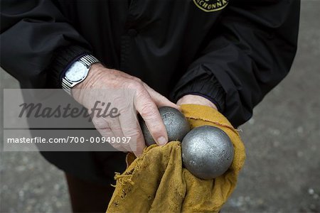 Man's Hands Holding Boules, Arcachon, Bordeaux, France