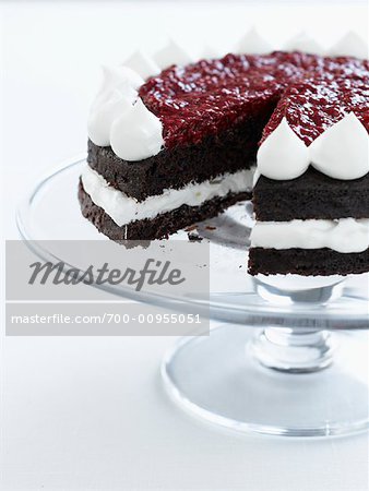 Chocolate Cake with Raspberry Topping with Piece Missing