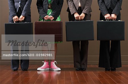 Businesswomen Holding Briefcases
