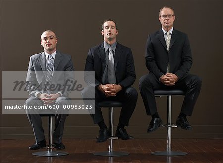 Trois hommes d'affaires