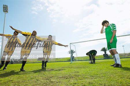 Applaudir les joueurs de soccer