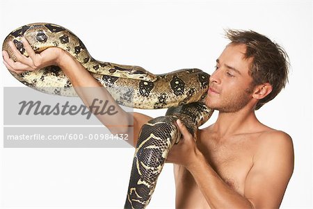 Portrait of Man with Boa Constrictor